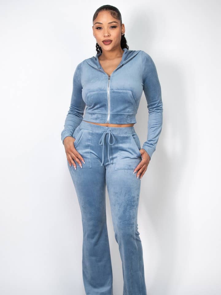 VELOUR FLARE MID RISE PANTS and other Purchase Wholesale flared sweatpants. Free Returns & Net 60 Terms on Faire trending on Faire.