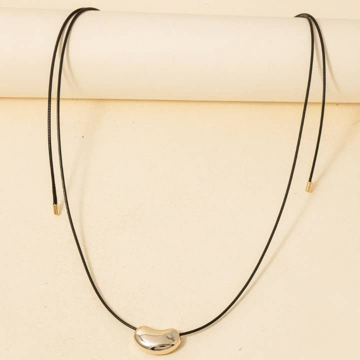 Cut Out Abstract Metallic Pendant Adjustable Cord Necklace for wholesale by Anarchy Street