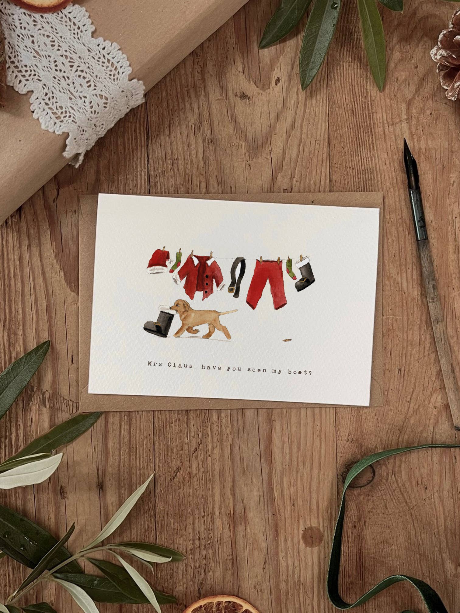 Brooke Marie - Vente Cartes de Noël - Naughty Puppy Où est ma botte ? Carte de Noël
