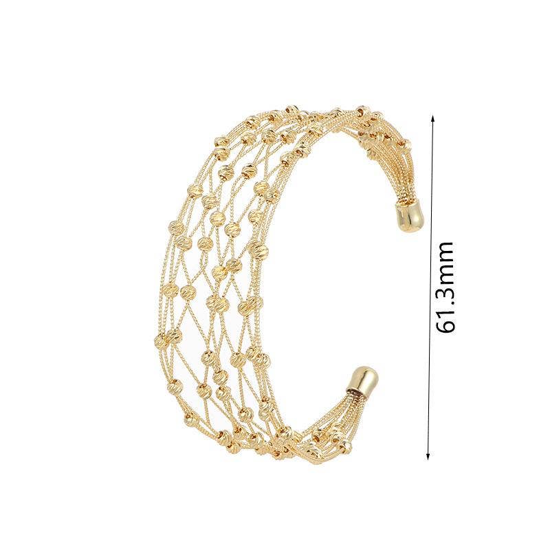 Mio Queena - Vente Bracelet manchette - Bracelet manchette en métal maillé et plaqué or 18 carats3