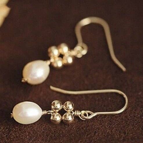 Korean Gold/silver Steel Beads 4-5mm Freshwater 7mm Oval Pearls Wire Wrapped Nickel Free Dangle Earrings for wholesale by Haengseongworkshop