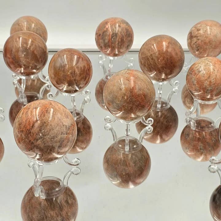 Small Peach Moonstone Crystal Spheres 2" for wholesale by Distinction Crystals