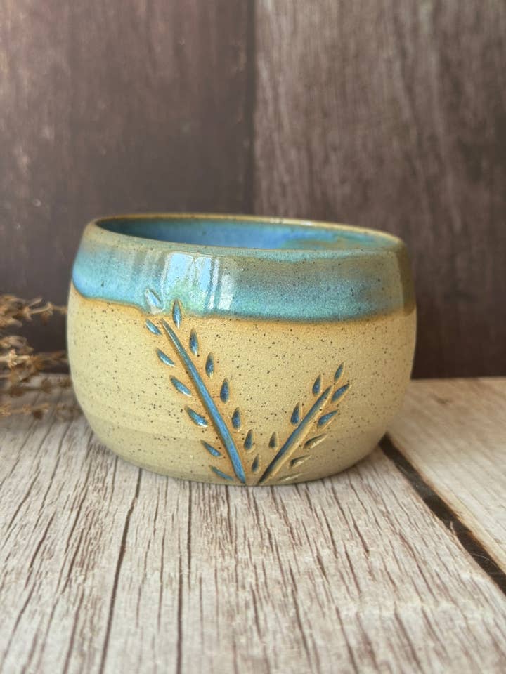 Mini hug mug in Blue with carved vine for wholesale by Wolf and Clay Pty Ltd