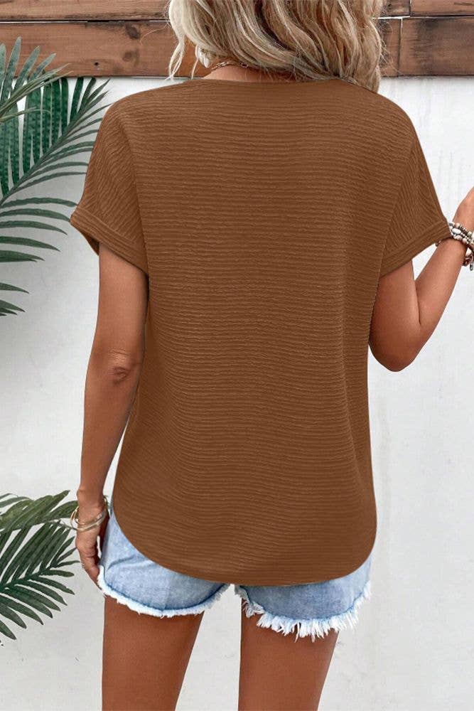 UNISHE - Venta al por mayor Jersey corto de punto - Mujer - Top de manga corta con cuello en V con textura lisa ZK158923