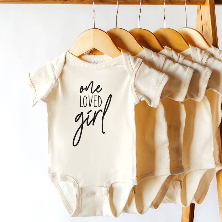 One Loved Girl Baby Bodysuit | Gifts for Babies | Clothes for wholesale by Dorothy’s Reason