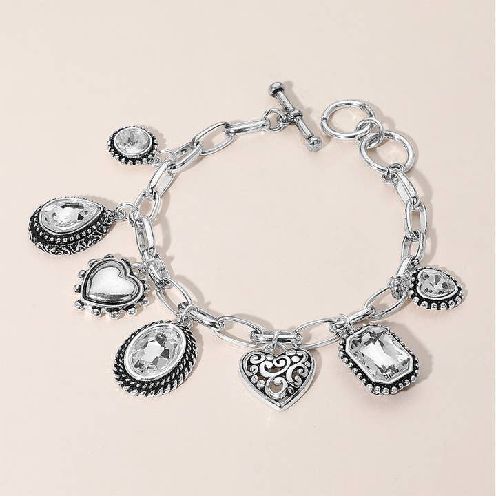 Sensibling Corp. – Großhandel Armband mit Charms/Anhängern – Tropfenförmiges Oval Rundstein Metallherz Anhänger Armband4