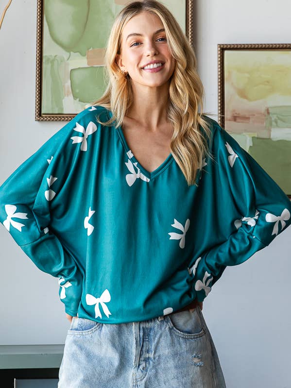 REMOVED BRAND - Wholesale Knit Top - Women's - Fall Bow Print V-Neck Long Sleeve Top in PLUS - HTP12471