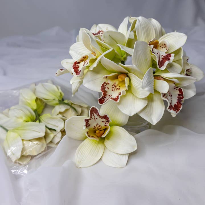 White/Burgundy Cymbidium Flowerhead ( 6 Pack ) - Realistic Artificial Flowers and other Purchase Wholesale bulkhead bulb. Free Returns & Net 60 Terms on Faire trending on Faire.