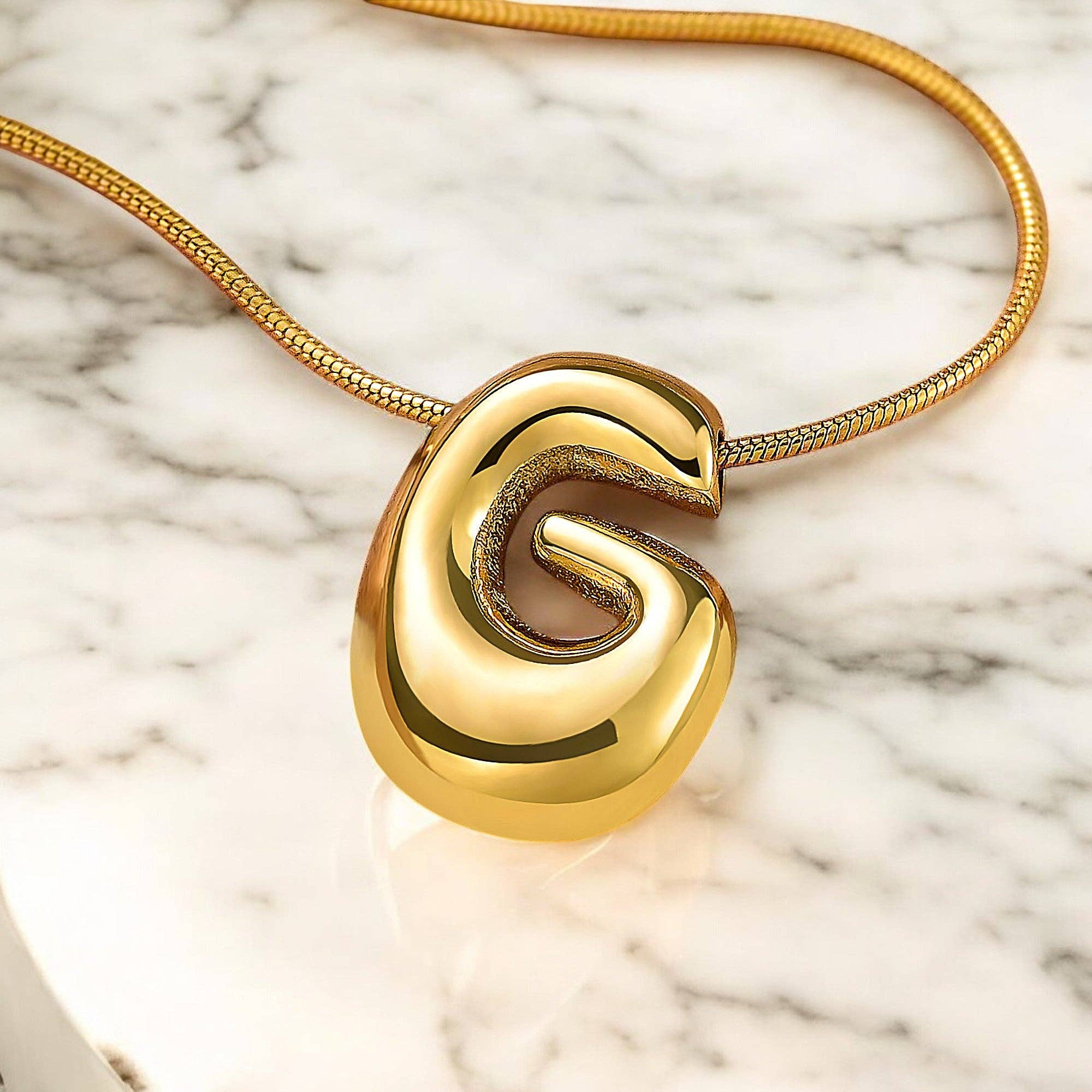 Cape Diablo - Vente Colliers à pendentif - Collier Initiale Lettre Bulle Chute Éclat Doré6