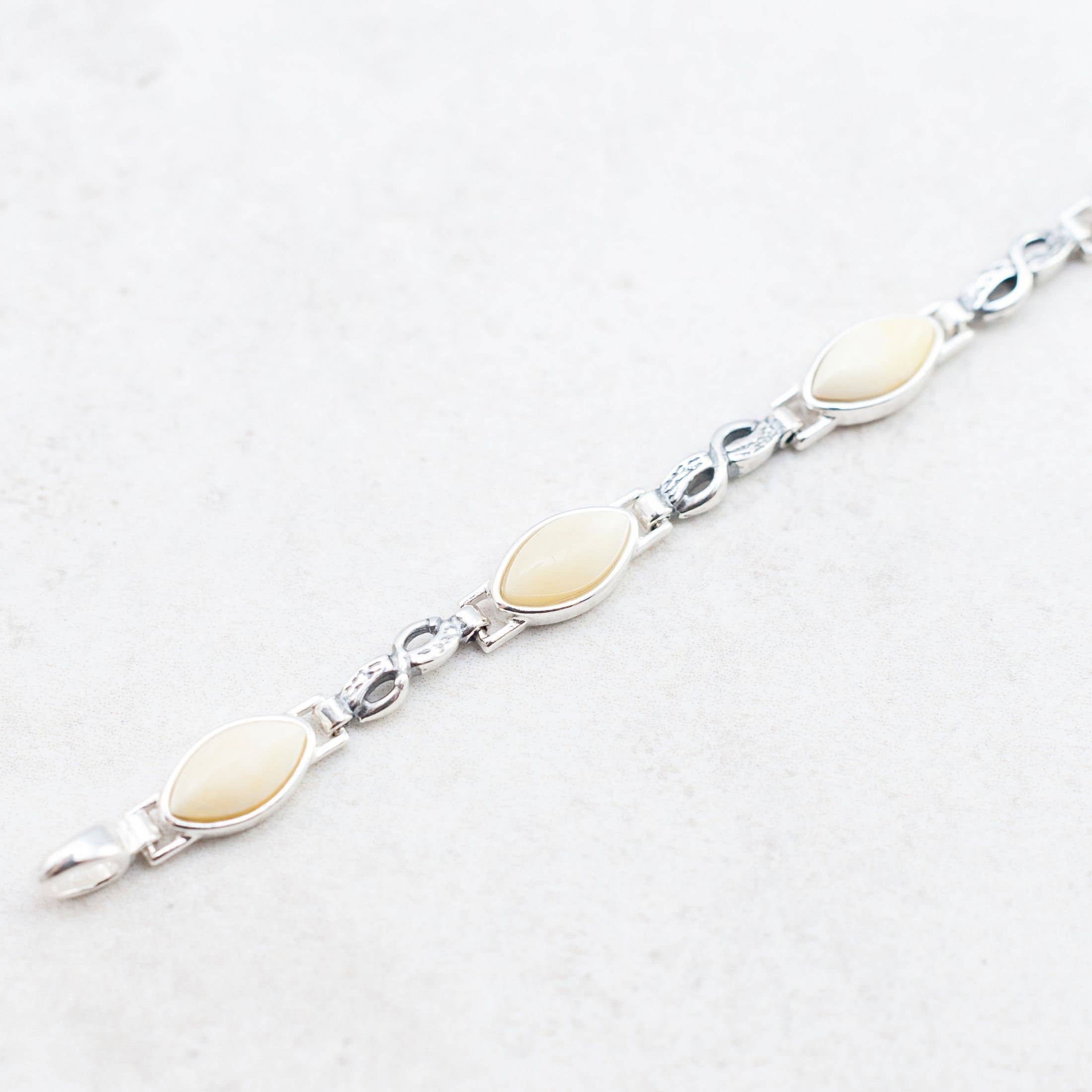 Marcin Waryszak - Vendita all'ingrosso Bracciali tennis - Bracciale in ambra caramellata, braccialetto in argento con maglie a forma di infinito1