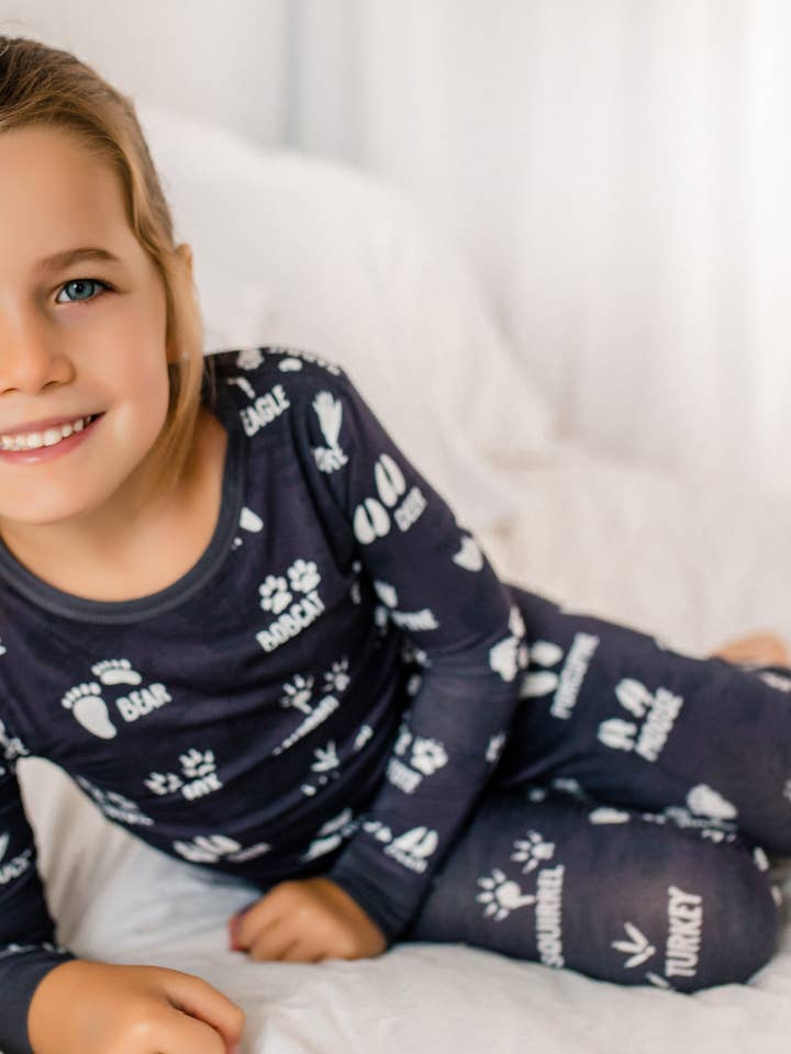 ⚓ Brayden- Maine Wild Animal Tracks Two Piece Pajama Set for wholesale by Bailey Baby Co.
