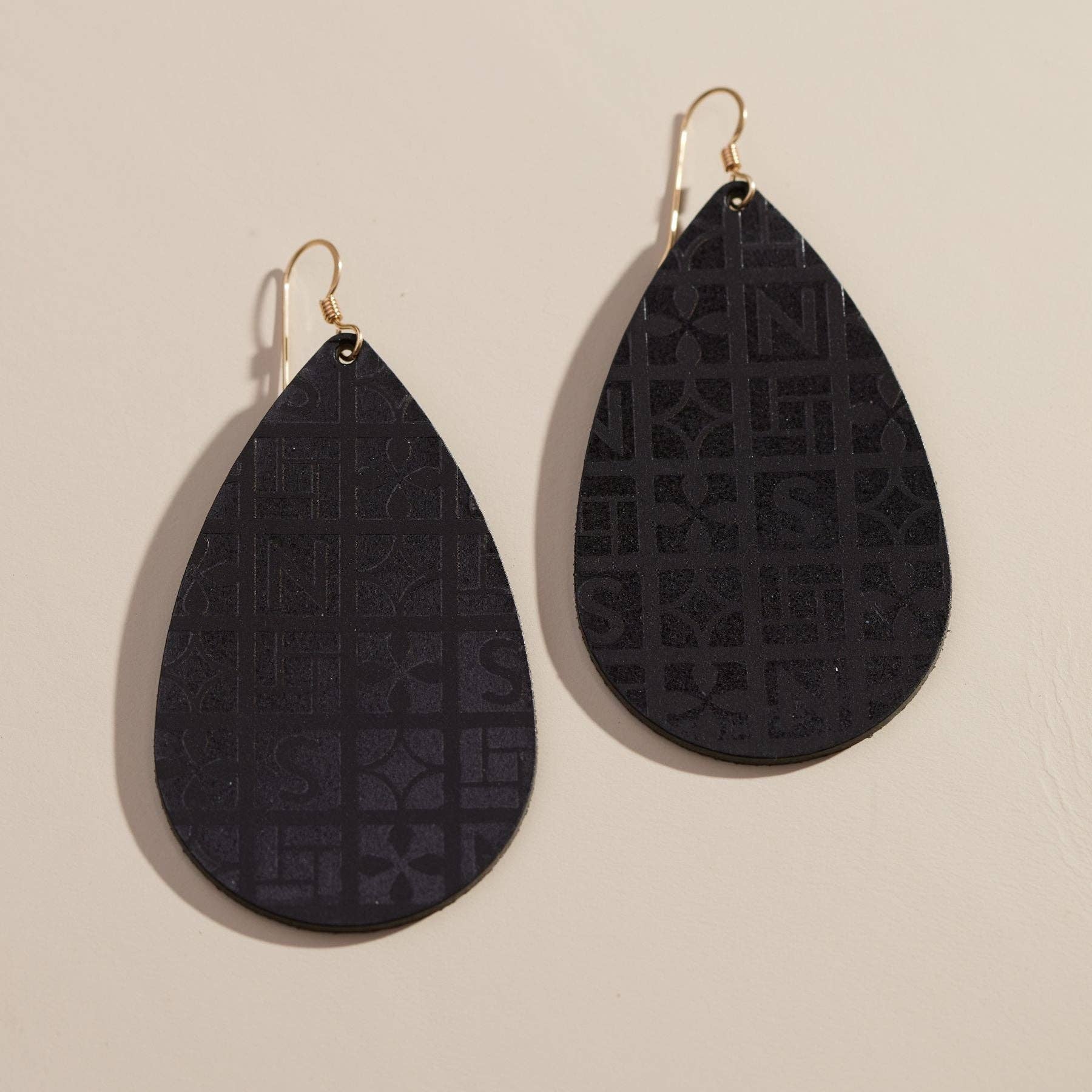 Wholesale Black Signature Teardrops for your store - Faire