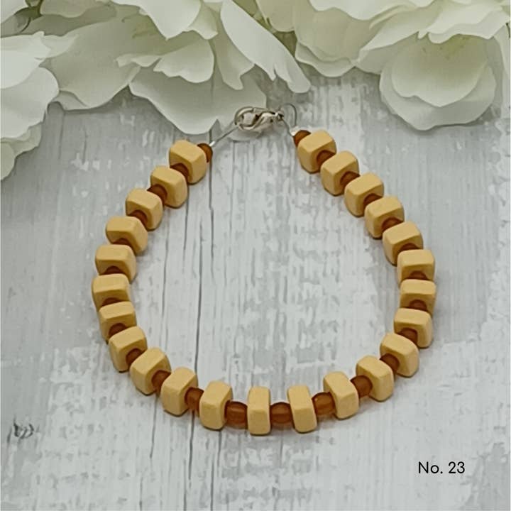 Bracelet perles céramique lentille 6mm - Ella pour la vente par perleperle