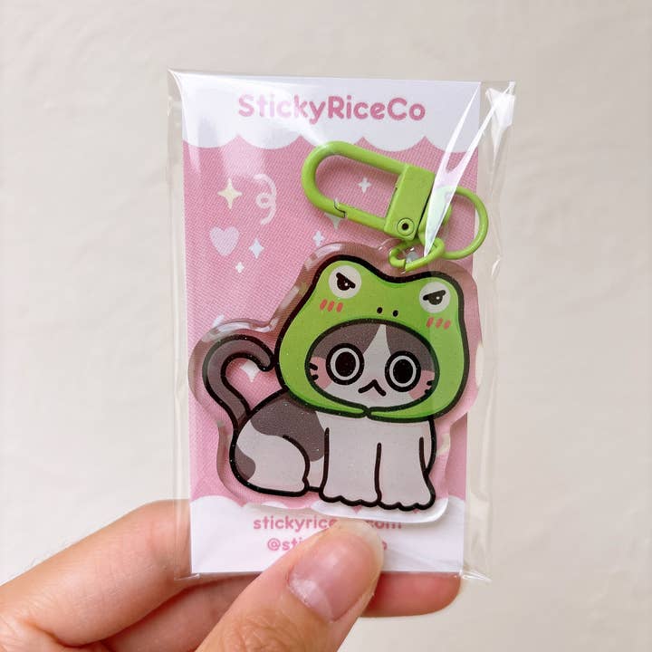 StickyRiceCo - Wholesale Keychain - Women's - Angry Frog Hat Cat Meme Glitter Keychain