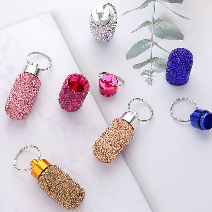 Bling Mini Pill Case Keychain
 and other Purchase wholesale self defense. Free returns & net 60 terms on Faire trending on Faire.
