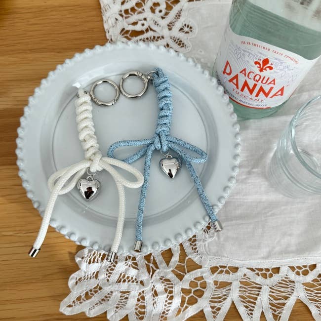 MOND HAUS - Venta al por mayor Llavero - Mujer - Orson Llavero | Encanto trenzado de cuerda con colgante de corazón7