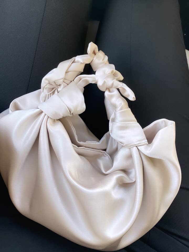 MEDIUM SIZE CHAMPAGNE NLA SILK KNOT BAG for wholesale by NLA Collection