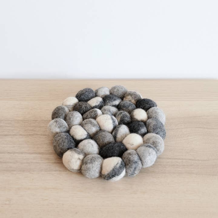 Thick Felt Ball Pebble-Stone Like Pot Trivet for wholesale by Ganapati & Co.
