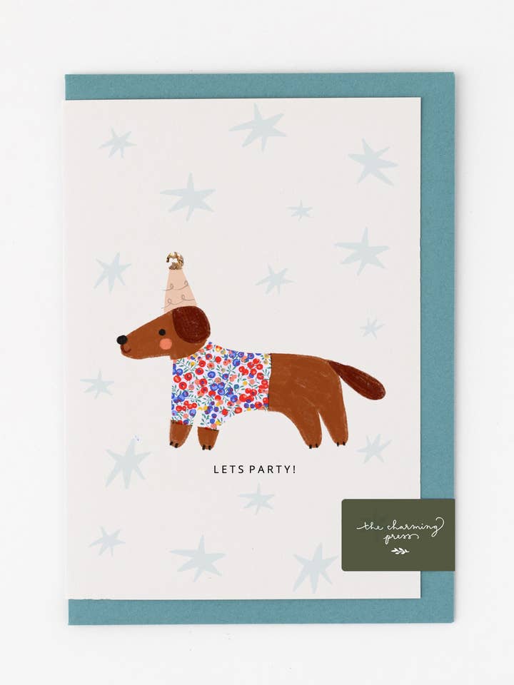 Biglietto di Natale Bassotto con tessuto Liberty Wiltshire Bud per la vendita all'ingrosso da parte di The Charming Press