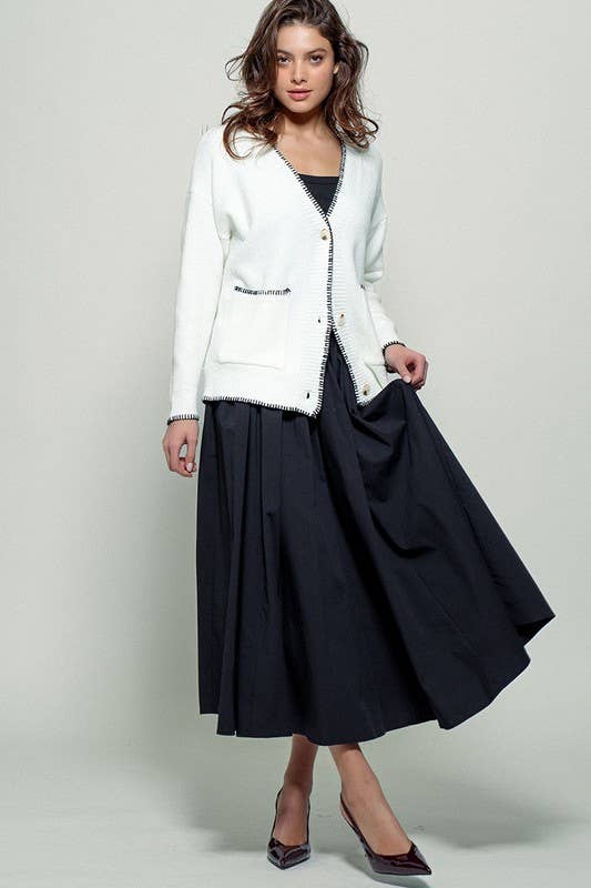 IVOIRE Cardigan en maille décontracté à boutons avec surpiqûres contrastées en vente sur Faire6