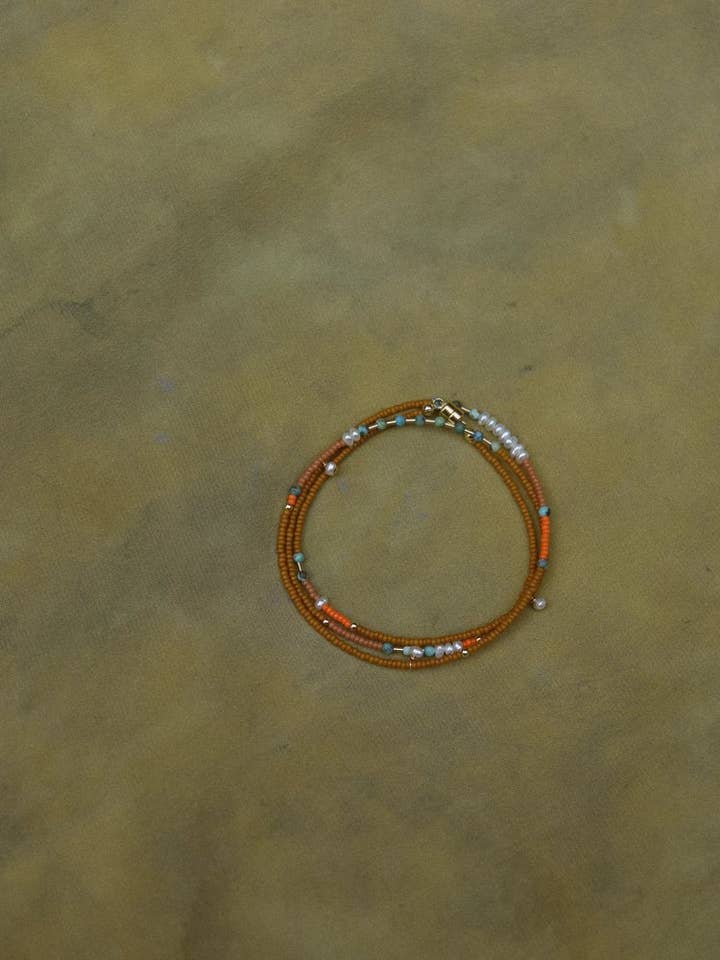 Wrap bracelet- in earth with freshwater pearls and turquoise for wholesale by Freestone