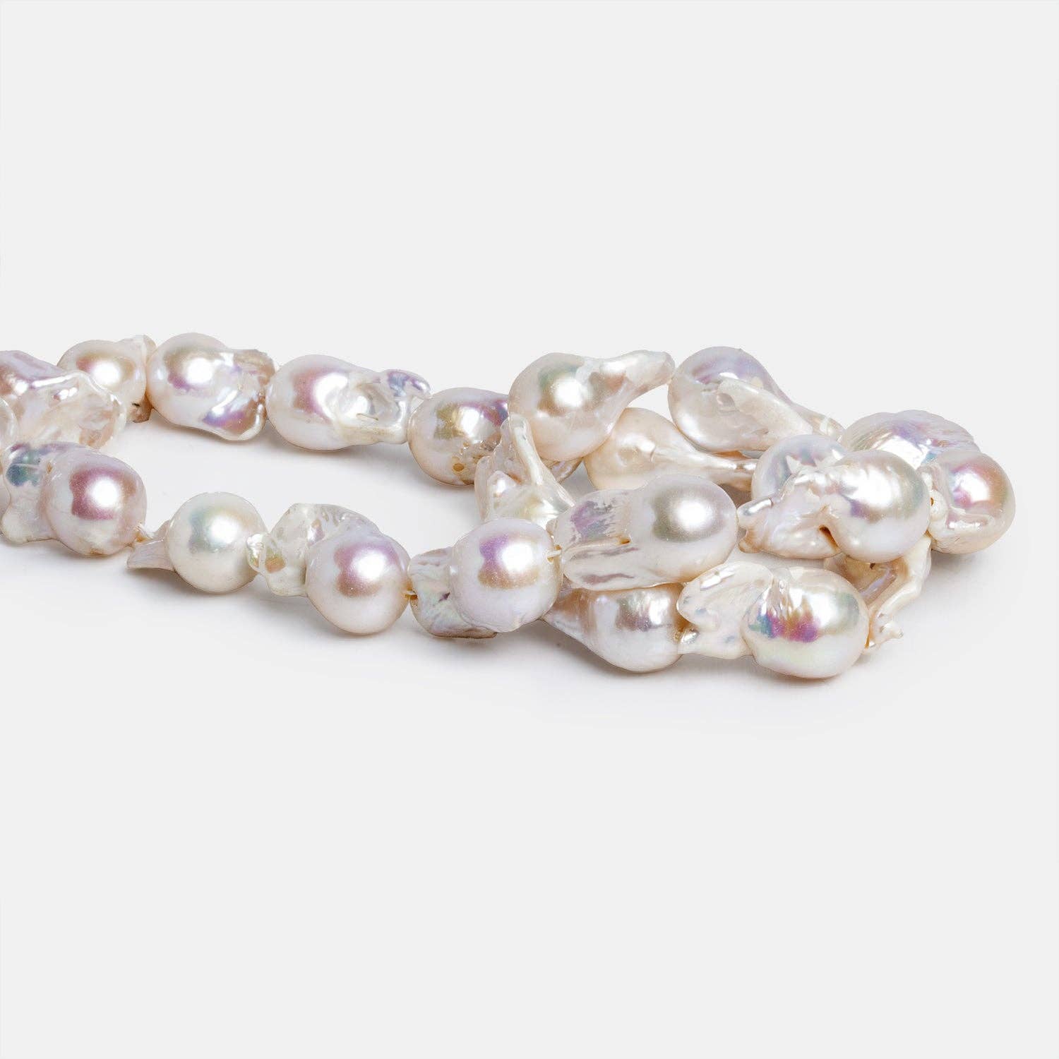 The Bead Traders - Wholesale Beads - 20x12mm White Ultra Baroque Pearls 16 inch 18 pieces1