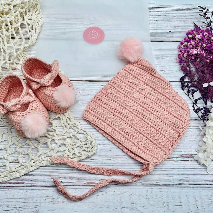 Handmade crochet baby Pompom Booties, Baby Bonnet for wholesale by CherisherBabies