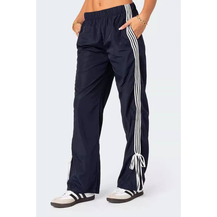 Bow Tie Detail Track Pants Sweatpants - 5 Colors and other Purchase Wholesale boys lie. Free Returns & Net 60 Terms on Faire trending on Faire.