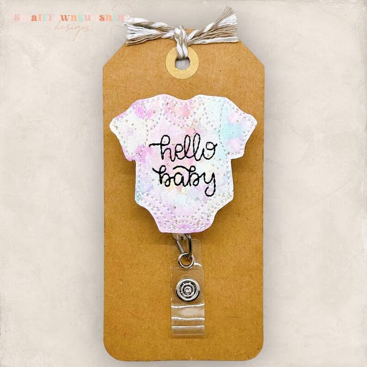 Hello Baby rompertje met Badge Reel voor wholesale door The SmallTownSunshine Company