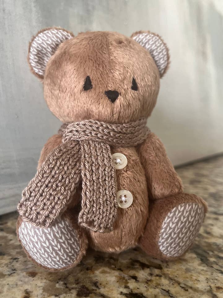 Light brown teddy bear with a scarf for wholesale by Frank and Bubby