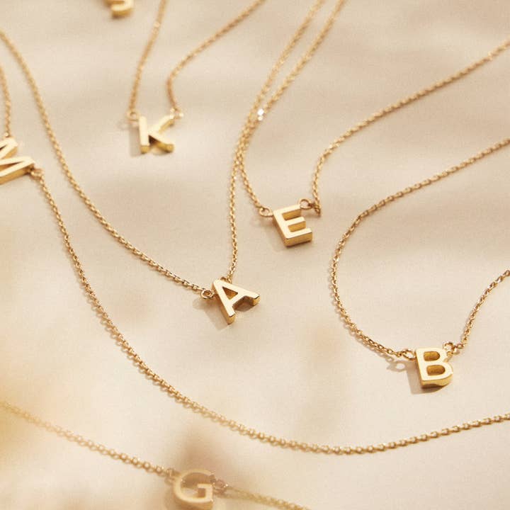 Initial Metal Letter Charm Short Necklace and other Purchase Wholesale initial. Free Returns & Net 60 Terms on Faire trending on Faire.