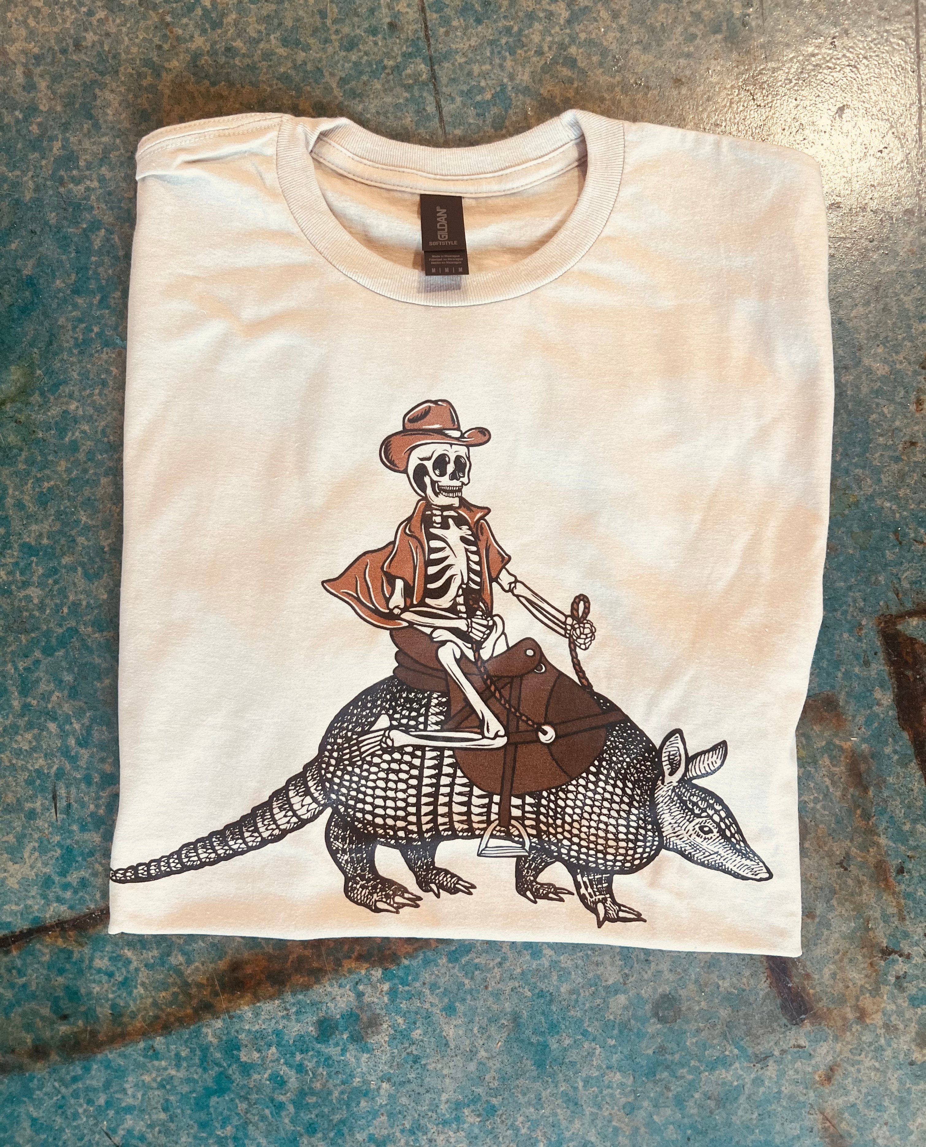 THE LATTIMORE CLAIM - Wholesale Screen Printed T-Shirt - Unisex - Skeleton on Armadillo - Multiple options