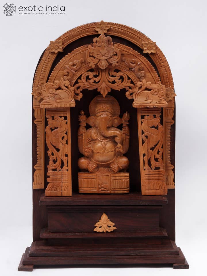 11" Seated Lord Ganesha Idol With Wood Carving for wholesale by Exotic India Art