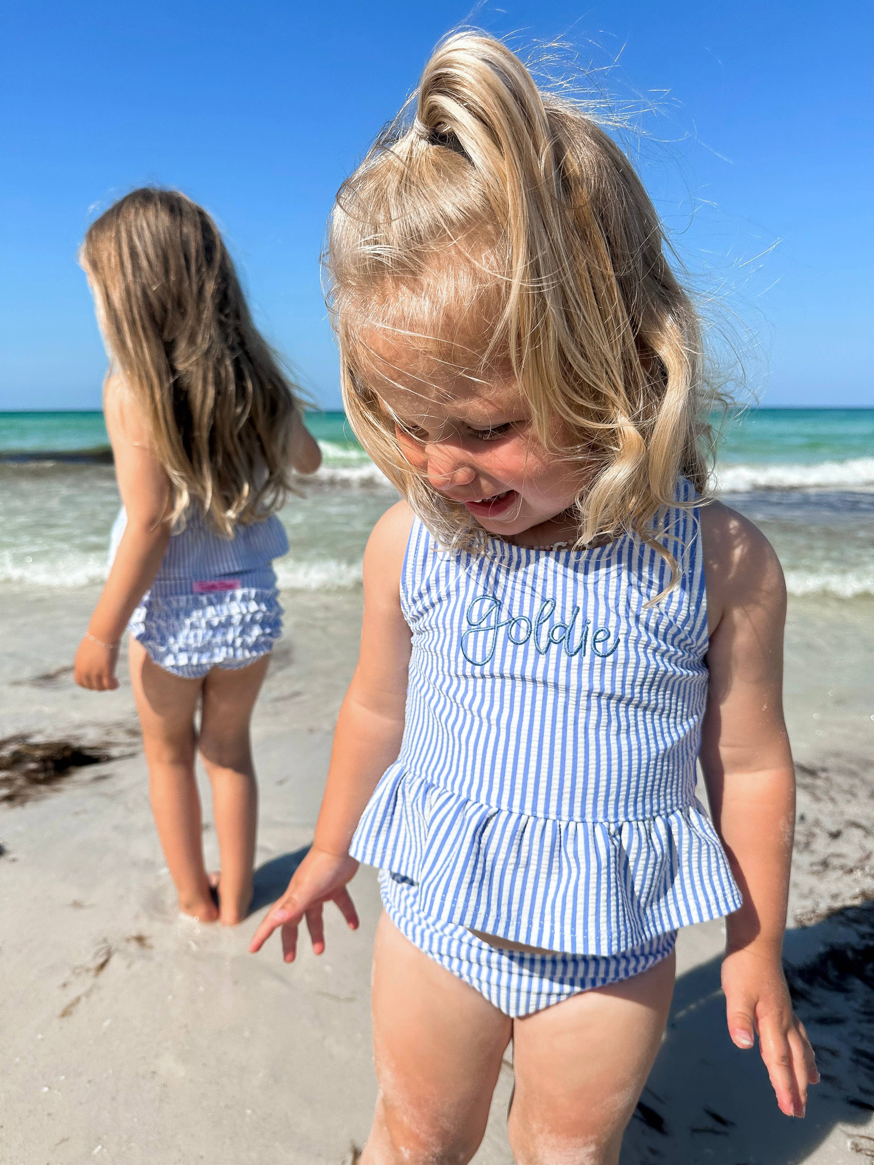 RuffleButts + RuggedButts – wholesale Two-piece swimsuit – Kids – Girls Periwinkle Blue Seersucker Peplum Tankini 2-Piece Swimsuit with Signature Rear Ruffles2
