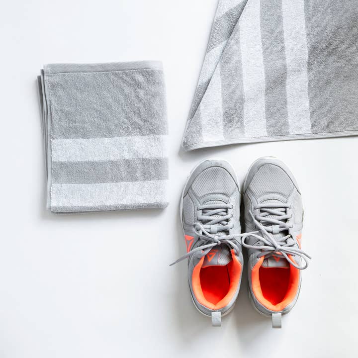 Striped Workout Towel in Quiet Gray for wholesale by Luzia
