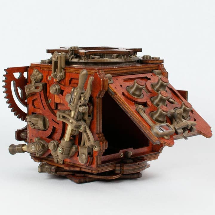 The famous Boxing Steampunk puzzle in “MECANIGMA” KIT for wholesale by NKD Puzzle