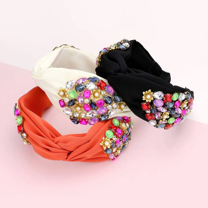 Bandolete Torcida com Flor Centralizada de Pérola e Pedras Multicoloridas Decorativas por atacado de Sensibling Corp.