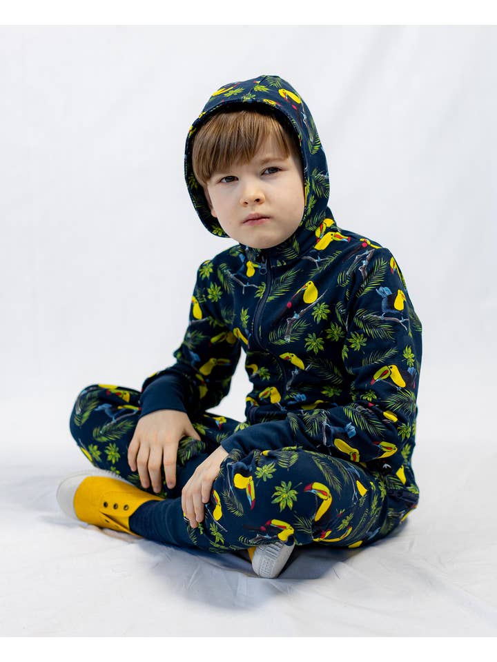 Warm jumpsuit with zipper rear, toucan print, blue for wholesale on Faire5