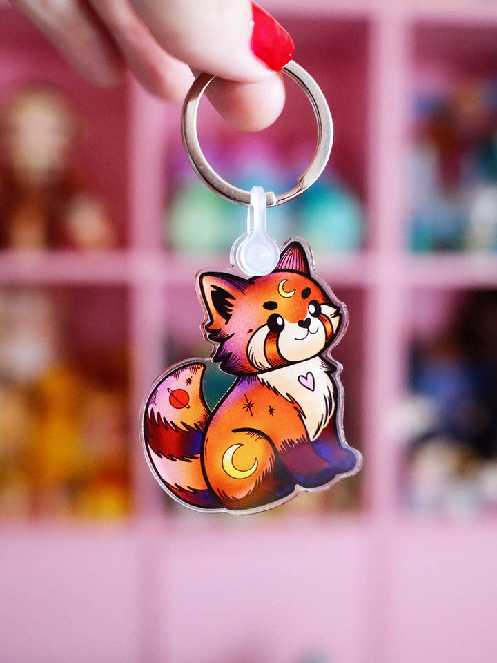 Cosmic Red Panda Keychain for wholesale by Poulette Magique