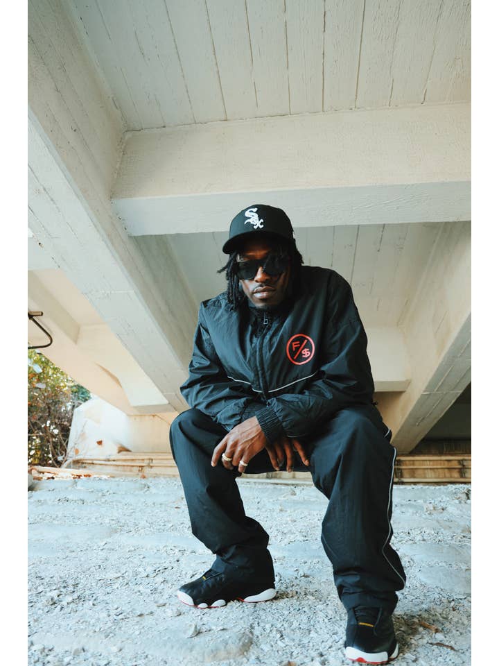 Black Red MOTION Nylon Pants (BRED) for wholesale on Faire4