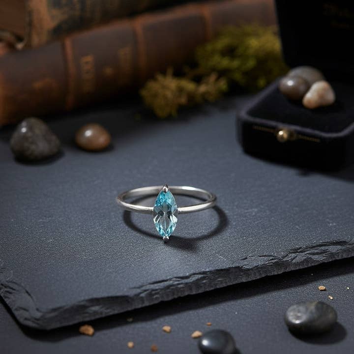 Celestial Point Ring: Natural Marquise Blue Topaz Solitaire in Sterling Silver for wholesale by Princejewelshub