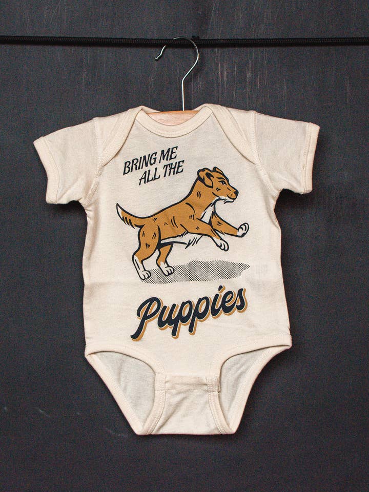 Natural Bring Me All The Puppies Infant Onesie for wholesale on Faire