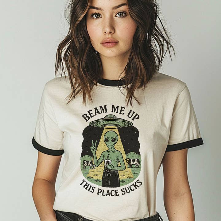 Natural Black Beam Me Up, This Place Sucks Funny Alien Ringer T-Shirt for wholesale on Faire0