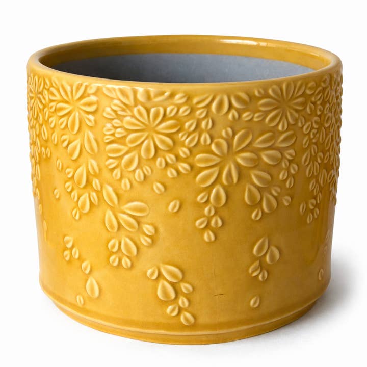 A11116: Floral ceramic pot cover, mustard gold, 5.5 in for wholesale by Silver Tree Home & Holiday
