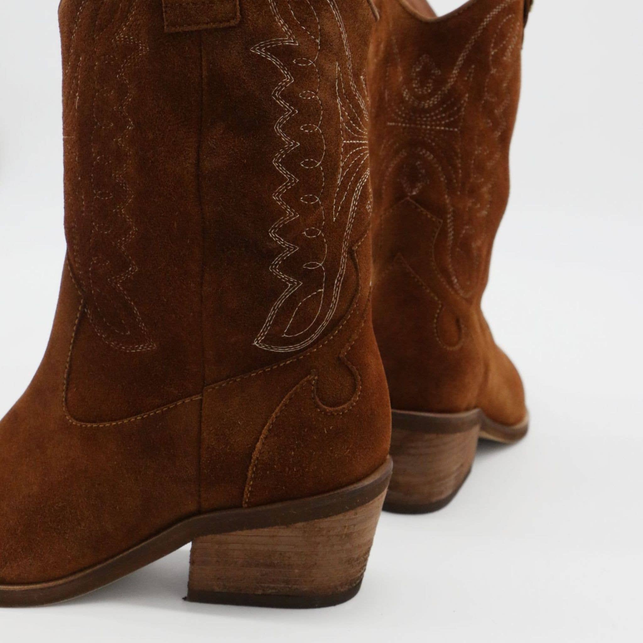 Bruin Onstuitbare westerse cowboylaarzen bruin suède damesschoenen voor groothandel op Faire7