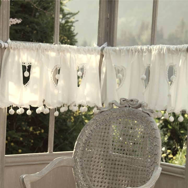 Brise Bise curtain with ecru pompoms for wholesale by LES SCULPTEURS DU LAC
