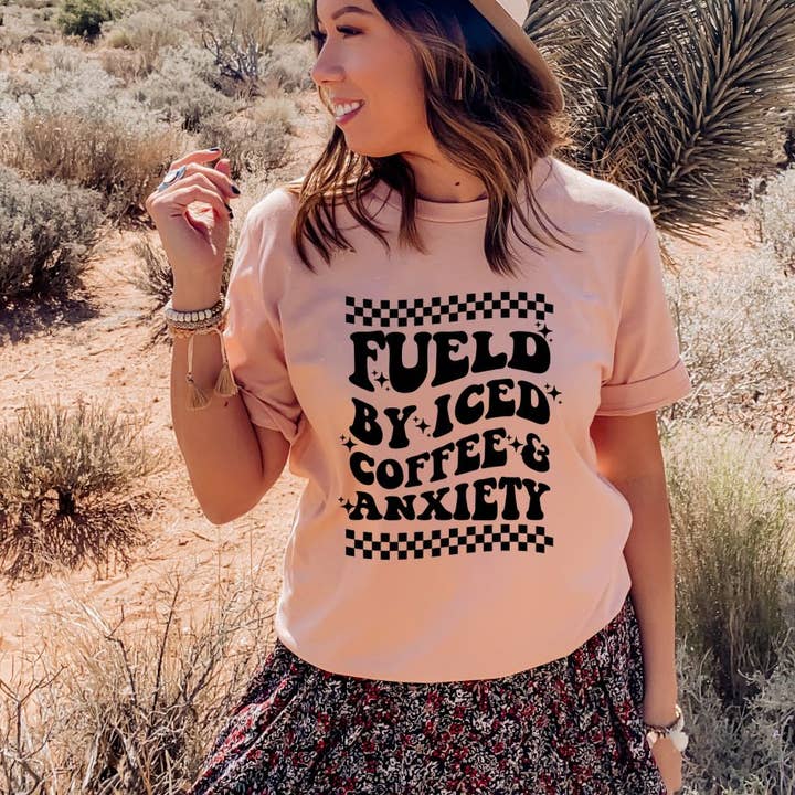 Fueled By Iced Coffee And Anxiety T-shirt | Graphic Shirt for wholesale by KM Clothing