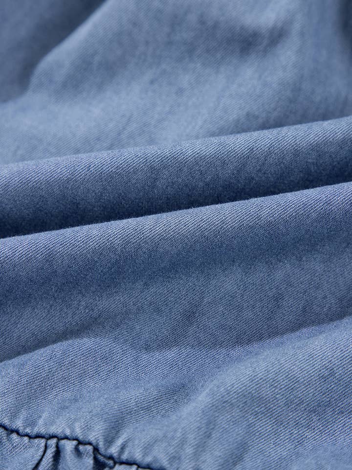 Ashleigh Blue Ruffled V Neck Smocked Denim Mini Dress for wholesale on Faire10