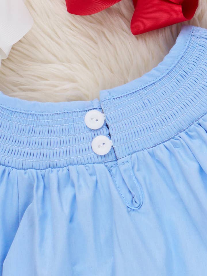 Marie Nicole Clothing - Wholesale Dress - Kids - Blue Chambray Smocked Santas Ruffle Dress2