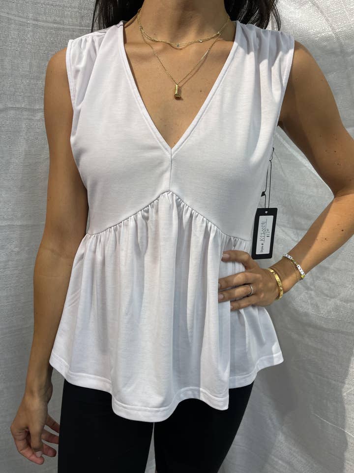 Haut en tricot à col en V pour la vente par JJ Star Apparel